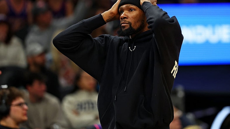 Jan 3, 2024; Phoenix, Arizona, USA; Phoenix Suns forward Kevin Durant (35) reacts from the bench during the fourth quarter of the game against the LA Clippers at Footprint Center. Mandatory Credit: Mark J. Rebilas-USA TODAY Sports