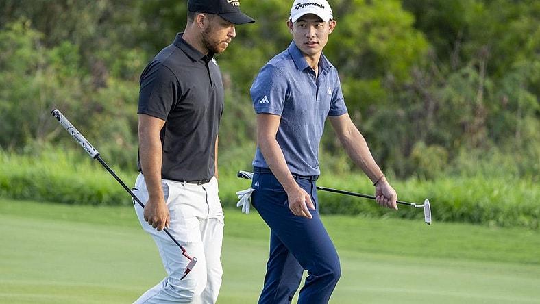 January 4, 2024; Maui, Hawaii, USA; Xander Schauffele (left) and Collin Morikawa (right) walk on the fourth hole during the first round of The Sentry Tournament of Champions golf tournament at Kapalua Golf - The Plantation Course. Mandatory Credit: Kyle Terada-USA TODAY Sports