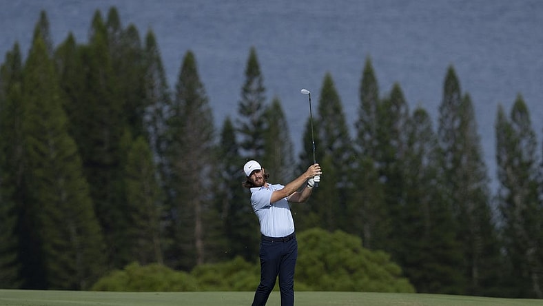 January 4, 2024; Maui, Hawaii, USA; Tommy Fleetwood hits his fairway shot on the fourth hole during the first round of The Sentry Tournament of Champions golf tournament at Kapalua Golf - The Plantation Course. Mandatory Credit: Kyle Terada-USA TODAY Sports
