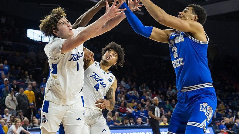 Jan 4, 2024; Tulsa, Oklahoma, USA; Tulsa Golden Hurricane forward Matt Reed (1) and guard PJ Haggerty (4) go for a loose ball against Memphis Tigers forward Nick Jourdain (2) during the second half at the Reynolds Center. The Memphis Tigers won the game 78-75. Mandatory Credit: Brett Rojo-USA TODAY Sports