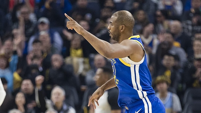Jan 4, 2024; San Francisco, California, USA; Golden State Warriors guard Chris Paul (3) reacts after hitting a three-point shot against the Denver Nuggets during the first half at Chase Center. Mandatory Credit: John Hefti-USA TODAY Sports