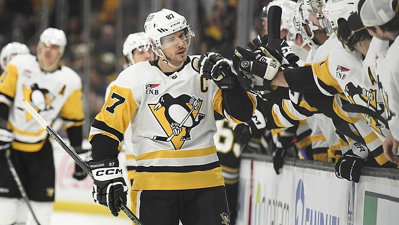 Jan 4, 2024; Boston, Massachusetts, USA; Pittsburgh Penguins center Sidney Crosby (87) celebrates his goal with his teammates during the third period against the Boston Bruins at TD Garden. Mandatory Credit: Bob DeChiara-USA TODAY Sports