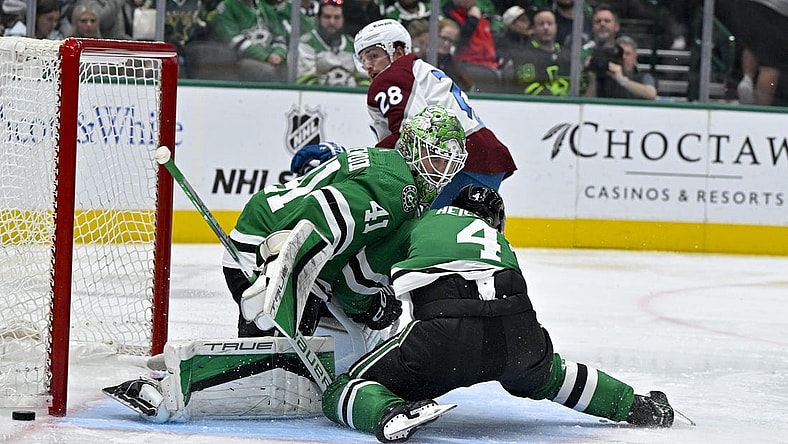 Jan 4, 2024; Dallas, Texas, USA; Dallas Stars defenseman Miro Heiskanen (4) collides with goaltender Scott Wedgewood (41) as they face a shot by Colorado Avalanche left wing Miles Wood (28) during the third period at the American Airlines Center. Mandatory Credit: Jerome Miron-USA TODAY Sports
