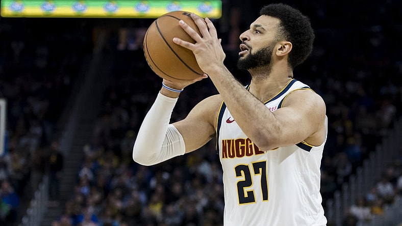 Jan 4, 2024; San Francisco, California, USA; Denver Nuggets guard Jamal Murray (27) shoots against the Golden State Warriors during the first half at Chase Center. Mandatory Credit: John Hefti-USA TODAY Sports