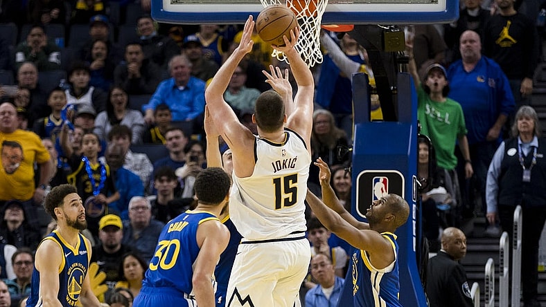 Jan 4, 2024; San Francisco, California, USA; Denver Nuggets center Nikola Jokic (15) hits a shot against the Golden State Warriors late in the second half at Chase Center. Mandatory Credit: John Hefti-USA TODAY Sports