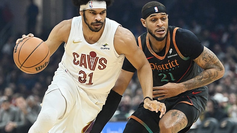 Jan 5, 2024; Cleveland, Ohio, USA; Cleveland Cavaliers center Jarrett Allen (31) drives to the basket against Washington Wizards center Daniel Gafford (21) during the first half at Rocket Mortgage FieldHouse. Mandatory Credit: Ken Blaze-USA TODAY Sports