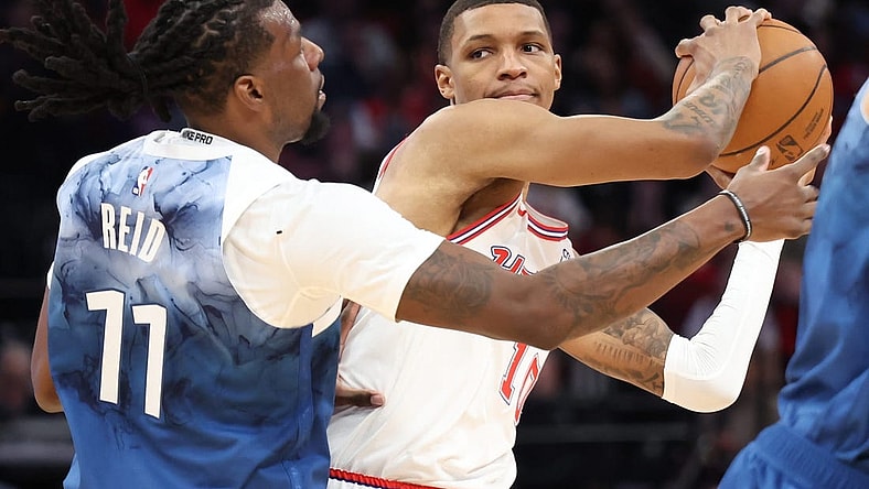 Jan 5, 2024; Houston, Texas, USA; Houston Rockets forward Jabari Smith Jr. (10) is defended by Minnesota Timberwolves center Naz Reid (11) in the second quarter at Toyota Center. Mandatory Credit: Thomas Shea-USA TODAY Sports