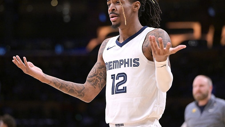Jan 5, 2024; Los Angeles, California, USA; Memphis Grizzlies guard Ja Morant (12) reacts in the second half against the Los Angeles Lakers at Crypto.com Arena. Mandatory Credit: Jayne Kamin-Oncea-USA TODAY Sports