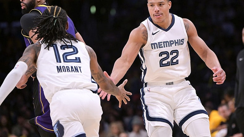 Jan 5, 2024; Los Angeles, California, USA; Memphis Grizzlies guard Desmond Bane (22) is congratulated by guard Ja Morant (12) after a three-point basket in the second half against the Los Angeles Lakers at Crypto.com Arena. Mandatory Credit: Jayne Kamin-Oncea-USA TODAY Sports
