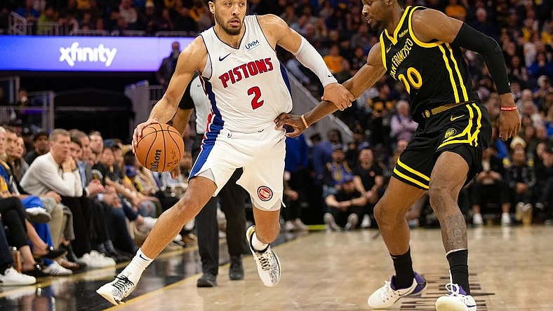 Jan 5, 2024; San Francisco, California, USA; Detroit Pistons guard Cade Cunningham (2) drives around Golden State Warriors guard Stephen Curry (30) during the fourth quarter at Chase Center. Mandatory Credit: D. Ross Cameron-USA TODAY Sports
