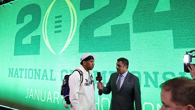 Jan 6, 2024; Houston, TX, USA; Washington Huskies quarterback Michael Penix Jr. (9) talks to the media during media day before the College Football Playoff national championship game against the Michigan Wolverines at George R Brown Convention Center. Mandatory Credit: Troy Taormina-USA TODAY Sports
