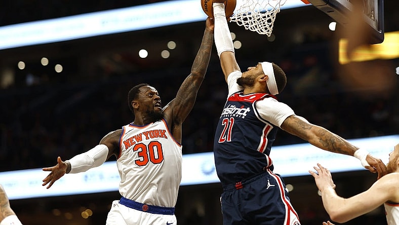 Jan 6, 2024; Washington, District of Columbia, USA; Washington Wizards center Daniel Gafford (21) blocks the shot of New York Knicks forward Julius Randle (30) in the second quarter at Capital One Arena. Mandatory Credit: Geoff Burke-USA TODAY Sports