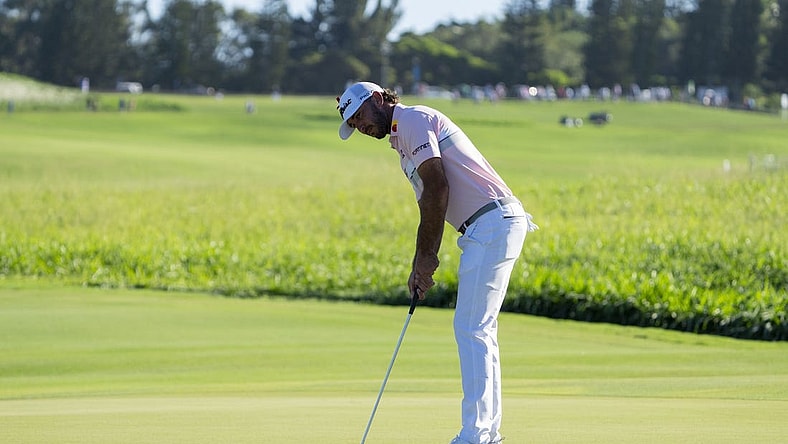 January 7, 2024; Maui, Hawaii, USA; Max Homa putts on the second hole during the final round of The Sentry golf tournament at Kapalua Golf - The Plantation Course. Mandatory Credit: Kyle Terada-USA TODAY Sports
