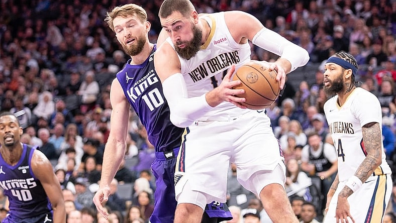 Jan 7, 2024; Sacramento, California, USA; New Orleans Pelicans center Jonas Valanciunas (17) grabs a rebound against Sacramento Kings forward Domantas Sabonis (10) during the second quarter at Golden 1 Center. Mandatory Credit: Ed Szczepanski-USA TODAY Sports