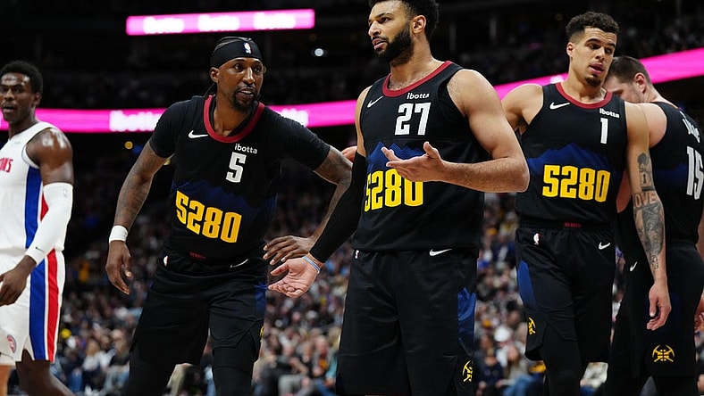 Jan 7, 2024; Denver, Colorado, USA; Denver Nuggets guard Jamal Murray (27) and guard Kentavious Caldwell-Pope (5) and forward Michael Porter Jr. (1) in the first quarter against the Detroit Pistons at Ball Arena. Mandatory Credit: Ron Chenoy-USA TODAY Sports