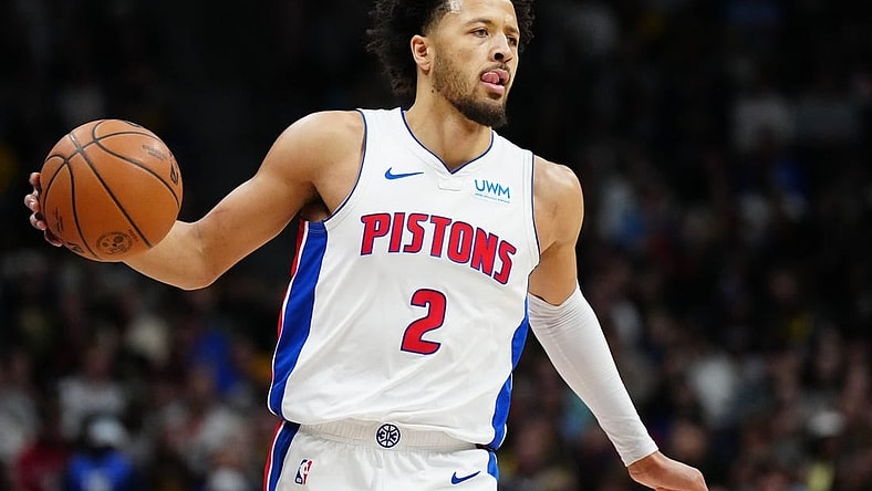 Jan 7, 2024; Denver, Colorado, USA; Detroit Pistons guard Cade Cunningham (2) controls the ball during the first quarter against the Denver Nuggets at Ball Arena. Mandatory Credit: Ron Chenoy-USA TODAY Sports
