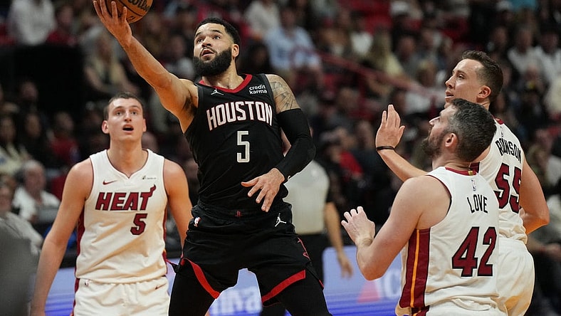 Jan 8, 2024; Miami, Florida, USA;  Houston Rockets guard Fred VanVleet (5) goes up for a shot against the Miami Heat during the second half at Kaseya Center. Mandatory Credit: Jim Rassol-USA TODAY Sports