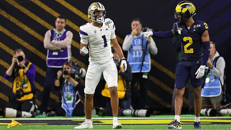 Jan 8, 2024; Houston, TX, USA; Washington Huskies wide receiver Rome Odunze (1) and Michigan Wolverines defensive back Will Johnson (2) react after a flag was thrown during the fourth quarter in the 2024 College Football Playoff national championship game at NRG Stadium. Mandatory Credit: Thomas Shea-USA TODAY Sports