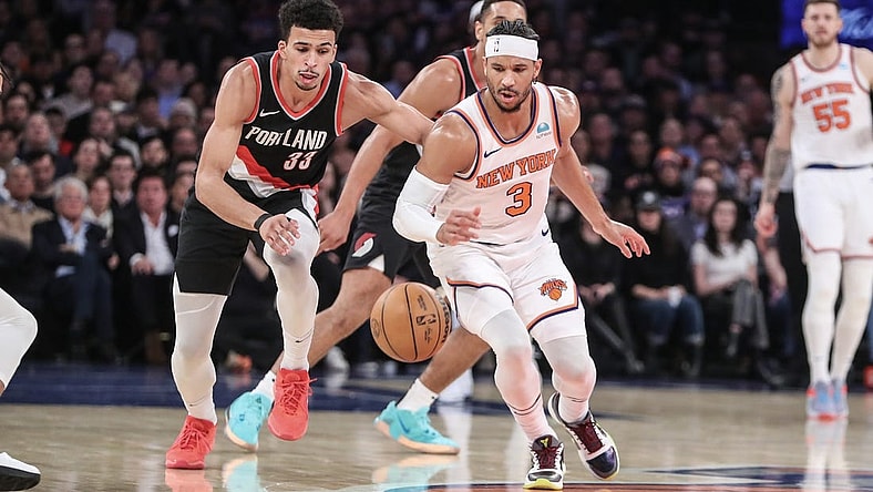 Jan 9, 2024; New York, New York, USA; Portland Trail Blazers forward Toumani Camara (33) and New York Knicks guard Josh Hart (3) chase a loose ball in the second quarter at Madison Square Garden. Mandatory Credit: Wendell Cruz-USA TODAY Sports
