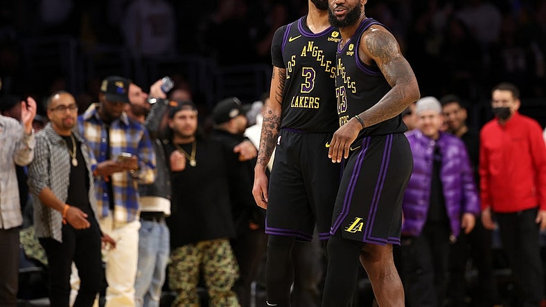 Jan 9, 2024; Los Angeles, California, USA;  Los Angeles Lakers forward LeBron James (23) celebrates a victory with forward Anthony Davis (3) after defeating the Toronto Raptors at Crypto.com Arena. Mandatory Credit: Kiyoshi Mio-USA TODAY Sports