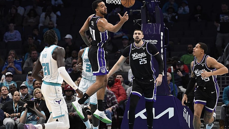 Jan 10, 2024; Charlotte, North Carolina, USA; Sacramento Kings forward Trey Lyles (41) gets a rebound during the first half against the Charlotte Hornets at the Spectrum Center. Mandatory Credit: Sam Sharpe-USA TODAY Sports