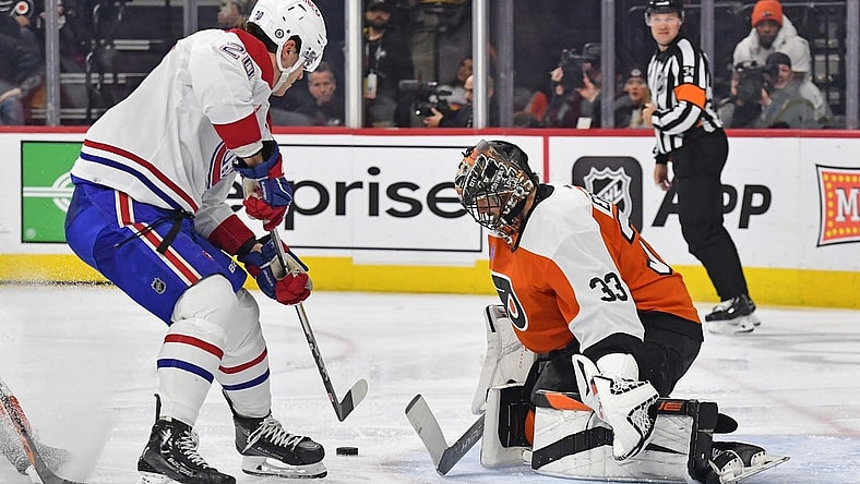 Jan 10, 2024; Philadelphia, Pennsylvania, USA; Philadelphia Flyers goaltender Samuel Ersson (33) makes a save against Montreal Canadiens left wing Juraj Slafkovsky (20) during the second period at Wells Fargo Center. Mandatory Credit: Eric Hartline-USA TODAY Sports