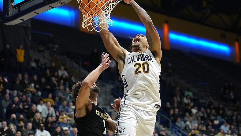 Jan 10, 2024; Berkeley, California, USA; California Golden Bears guard Jaylon Tyson (20) dunks against Colorado Buffaloes guard J'Vonne Hadley (1) during the second half at Haas Pavilion. Mandatory Credit: Darren Yamashita-USA TODAY Sports