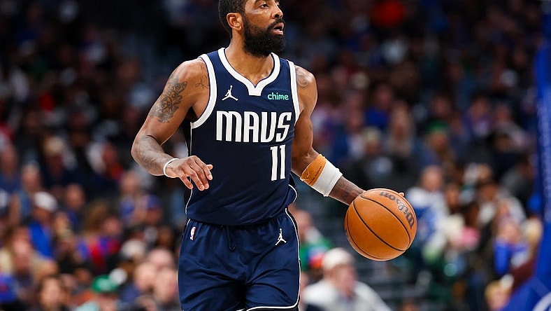 Jan 11, 2024; Dallas, Texas, USA;  Dallas Mavericks guard Kyrie Irving (11) dribbles during the second half against the New York Knicks at American Airlines Center. Mandatory Credit: Kevin Jairaj-USA TODAY Sports