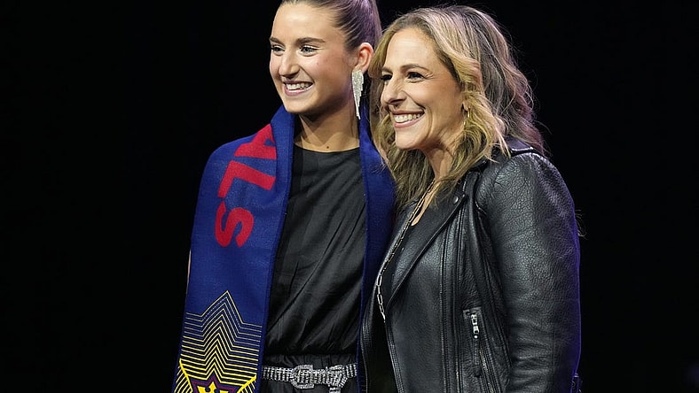 Jan 12, 2024; Anaheim, California, USA; University of North Carolina player Ally Sentnor (left) poses with NWSL commissioner Jessica Berman (right) after being selected by Utah Royals FC during the 2024 NWSL Draft at Anaheim Convention Center. Mandatory Credit: Kirby Lee-USA TODAY Sports