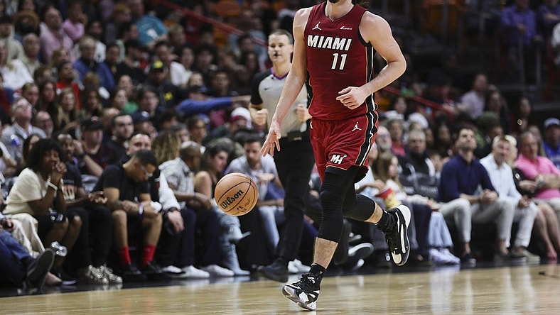 Jan 12, 2024; Miami, Florida, USA; Miami Heat guard Jaime Jaquez Jr. (11) dribbles the basketball against the Orlando Magic during the second quarter at Kaseya Center. Mandatory Credit: Sam Navarro-USA TODAY Sports