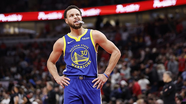 Jan 12, 2024; Chicago, Illinois, USA; Golden State Warriors guard Stephen Curry (30) reacts after a play during the second half against the Chicago Bulls at United Center. Mandatory Credit: Kamil Krzaczynski-USA TODAY Sports