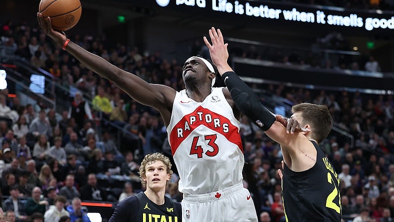 Jan 12, 2024; Salt Lake City, Utah, USA; Toronto Raptors forward Pascal Siakam (43) lays the ball up past Utah Jazz center Walker Kessler (24) during the third quarter at Delta Center. Mandatory Credit: Rob Gray-USA TODAY Sports