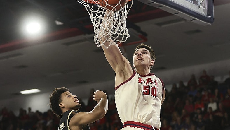 Jan 14, 2024; Boca Raton, Florida, USA; Florida Atlantic Owls center Vladislav Goldin (50) dunks the basketball against the UAB Blazers during the second half at Eleanor R. Baldwin Arena. Mandatory Credit: Sam Navarro-USA TODAY Sports