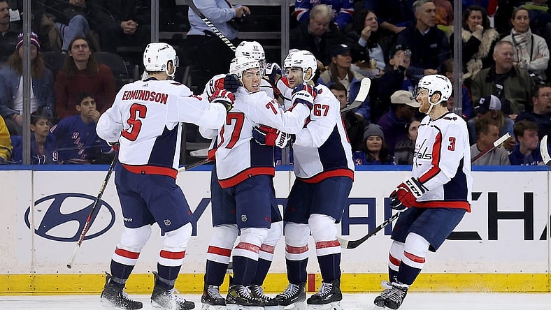 Jan 14, 2024; New York, New York, USA; Washington Capitals right wing T.J. Oshie (77) celebrates his goal against the New York Rangers with teammates during the second period at Madison Square Garden. Mandatory Credit: Brad Penner-USA TODAY Sports