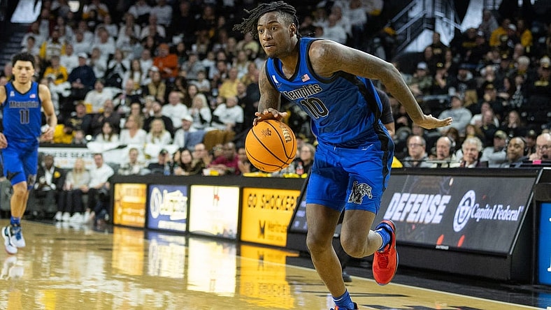 Jan 14, 2024; Wichita, Kansas, USA; Memphis Tigers guard Jaykwon Walton (10) brings the ball up court during the second half against the Wichita State Shockers at Charles Koch Arena. Mandatory Credit: William Purnell-USA TODAY Sports