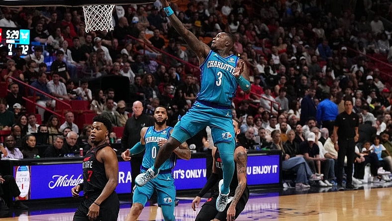 Jan 14, 2024; Miami, Florida, USA; Charlotte Hornets guard Terry Rozier (3) puts up a shot against the Miami Heat during the second half at Kaseya Center. Mandatory Credit: Jasen Vinlove-USA TODAY Sports