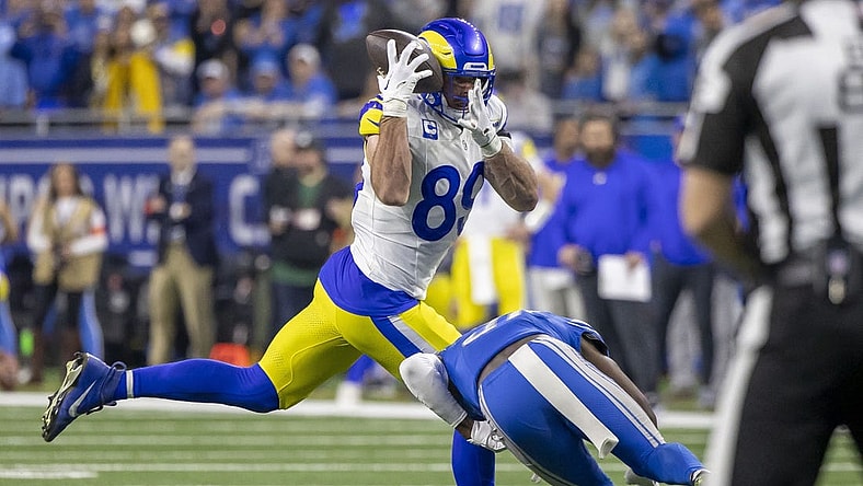 Jan 14, 2024; Detroit, Michigan, USA; Detroit Lions safety Kerby Joseph (31) breaks up a catch attempt by Los Angeles Rams tight end Tyler Higbee (89) during the second half of a 2024 NFC wild card game at Ford Field. Mandatory Credit: David Reginek-USA TODAY Sports