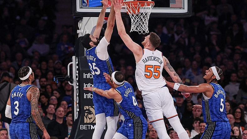 Jan 15, 2024; New York, New York, USA; Orlando Magic center Goga Bitadze (35) rebounds against New York Knicks center Isaiah Hartenstein (55) during the first half at Madison Square Garden. Mandatory Credit: Vincent Carchietta-USA TODAY Sports