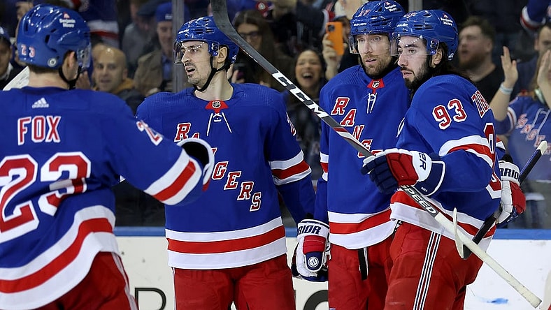Jan 16, 2024; New York, New York, USA; New York Rangers right wing Blake Wheeler (17) celebrates his empty net goal against the Seattle Kraken with defenseman Adam Fox (23) and left wing Chris Kreider (20) and center Mika Zibanejad (93) during the third period at Madison Square Garden. Mandatory Credit: Brad Penner-USA TODAY Sports