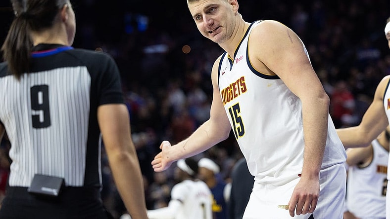Jan 16, 2024; Philadelphia, Pennsylvania, USA; Denver Nuggets center Nikola Jokic (15) questions an officials call during the fourth quarter against the Philadelphia 76ers at Wells Fargo Center. Mandatory Credit: Bill Streicher-USA TODAY Sports