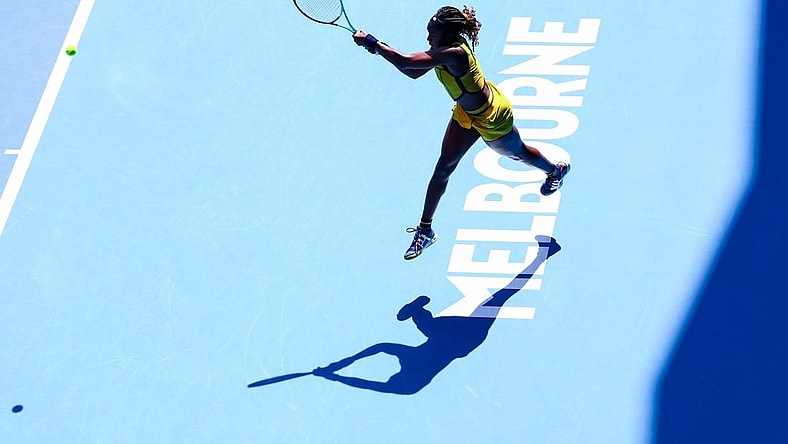 Jan 17, 2024; Melbourne, Victoria, Australia; Coco Gauff of the United States plays a shot against Caroline Dolehide (not pictured) also of the United States in Round 2 of the Women's Singles on Day 4 of the Australian Open tennis at Margaret Court Arena. Mandatory Credit: Mike Frey-USA TODAY Sports