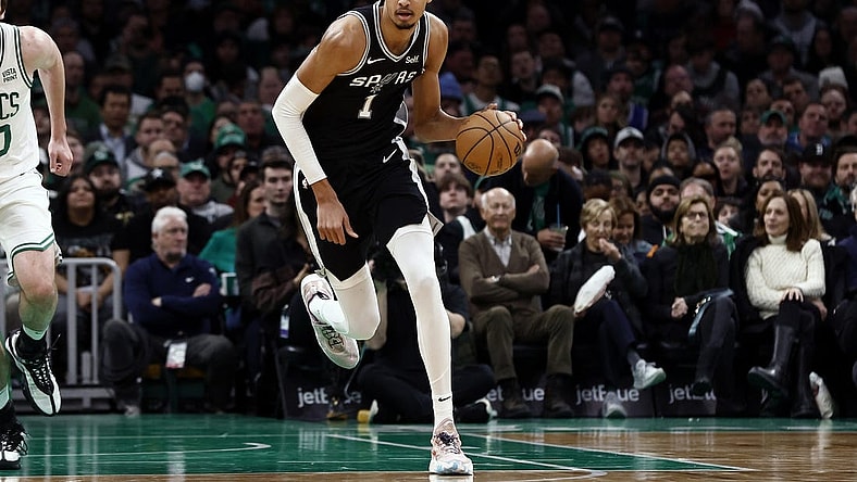 Jan 17, 2024; Boston, Massachusetts, USA; San Antonio Spurs center Victor Wembanyama (1) brings the ball up the court against the Boston Celtics during the second half at TD Garden. Mandatory Credit: Winslow Townson-USA TODAY Sports