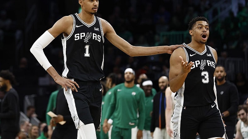 Jan 17, 2024; Boston, Massachusetts, USA; San Antonio Spurs center Victor Wembanyama (1) and forward Keldon Johnson (3) head for the bench during the second half of their game against the Boston Celtics at TD Garden. Mandatory Credit: Winslow Townson-USA TODAY Sports