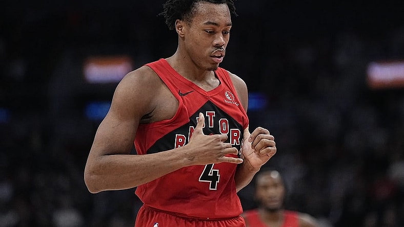 Jan 17, 2024; Toronto, Ontario, CAN; Toronto Raptors forward Scottie Barnes (4) during a break in the action against the Miami Heat during the first half at Scotiabank Arena. Mandatory Credit: John E. Sokolowski-USA TODAY Sports