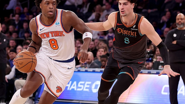Jan 18, 2024; New York, New York, USA; New York Knicks forward OG Anunoby (8) drives to the basket against Washington Wizards forward Deni Avdija (8) during the second quarter at Madison Square Garden. Mandatory Credit: Brad Penner-USA TODAY Sports