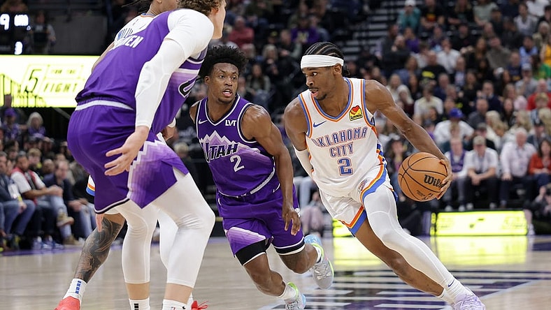 Jan 18, 2024; Salt Lake City, Utah, USA;  Utah Jazz guard Collin Sexton (2) runs past Utah Jazz guard Collin Sexton (2) during the second quarter at Delta Center. Mandatory Credit: Chris Nicoll-USA TODAY Sports