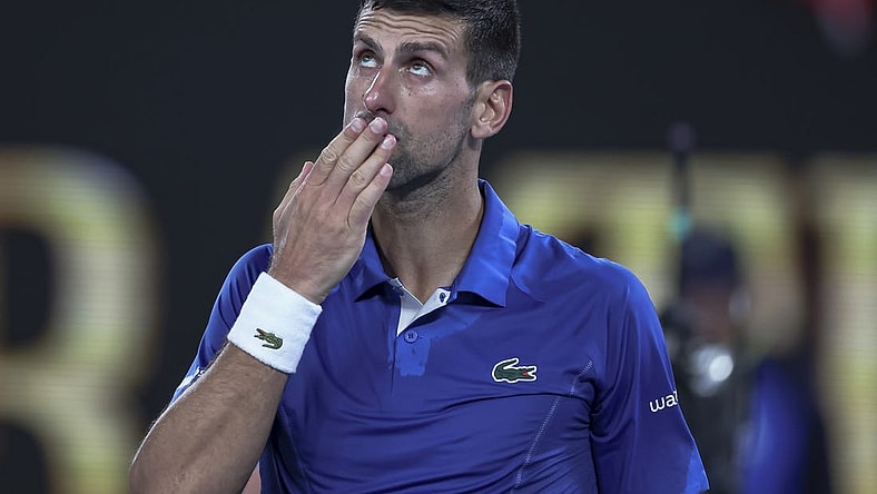 Jan 19, 2024; Melbourne, Victoria, Australia; Novak Djokovic of Serbia celebrates his win against Tomas Martin Etcheverry (not pictured) of Argentina in Round 3 of the Men's Singles on Day 6 of the Australian Open tennis at Rod Laver Arena. Mandatory Credit: Mike Frey-USA TODAY Sports