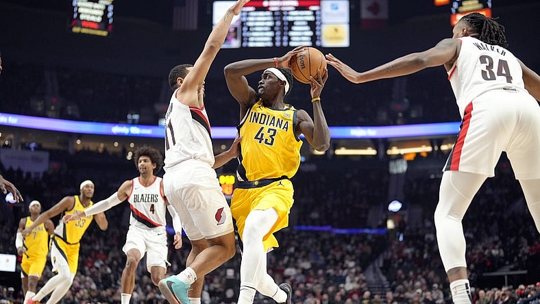 Jan 19, 2024; Portland, Oregon, USA; Indiana Pacers power forward Pascal Siakam (43) looks to pass while defended by Portland Trail Blazers point guard Malcolm Brogdon (11) during the first half at Moda Center. Mandatory Credit: Soobum Im-USA TODAY Sports
