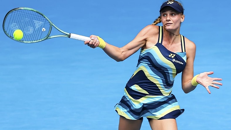 Jan 20, 2024; Melbourne, Victoria, Australia; Dayana Yastremska of Ukraine plays a shot against Emma Navarro (not pictured) of the United States in Round 3 of the Women's Singles on Day 6 of the Australian Open tennis at John Cain Arena. Mandatory Credit: Mike Frey-USA TODAY Sports