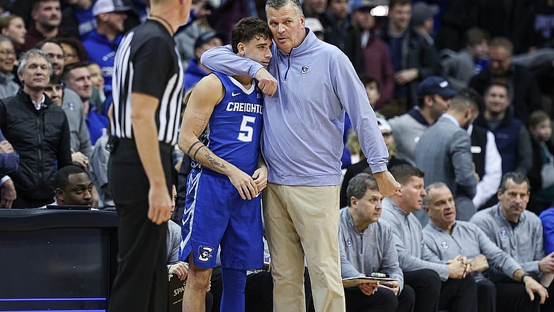 Jan 20, 2024; Newark, New Jersey, USA; Creighton Bluejays head coach Greg McDermott talks with guard Francisco Farabello (5) during triple overtime against the Seton Hall Pirates at Prudential Center. Mandatory Credit: Vincent Carchietta-USA TODAY Sports